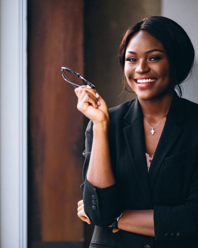 African american business woman by the window